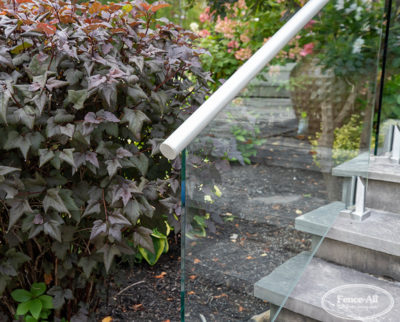 postlss glass railing w/stainless feet and secondary rail