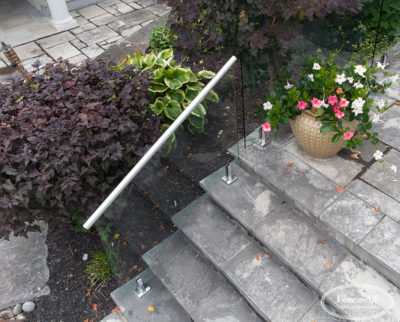 postless glass railing w/stainless feet and secondary rail